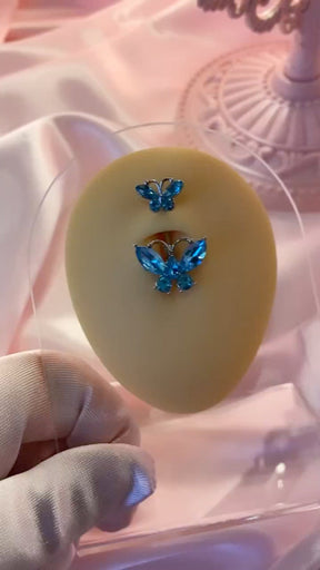 Double Butterfly Bauchnabelpiercing